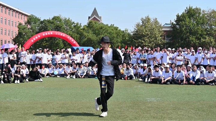 High School Students Jump Billie Jean High School Athletic Day Halftime Show