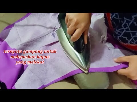 cara membersihkan kapas yang lengket di baju menggunakan setrika...!!