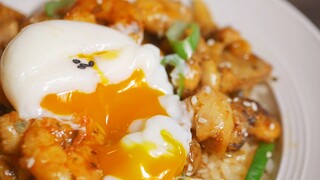 Food making- Rice served with chicken leg & shrimp meat & spring egg