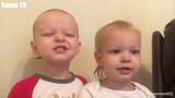 Cute Twins Toddler Play Together and Occasionally Have Interesting Confrontation
