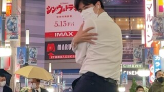Man in suit dances fearless in Kabukicho