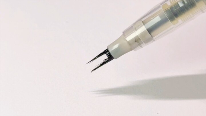A pen with a split tip? Will it tip over when used for writing?