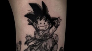 Black & Gray Dragon Ball Tattoo