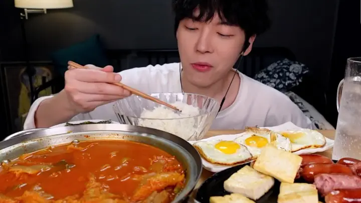 Sio Eating Show. Pork Stew with Kimchi, Egg, Rice And Sausage