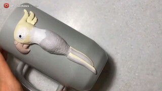 Sculpting a parrot from clay