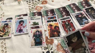 ASMR playing solitaire with Attack on Titan playing cards (tapping, whisper, AOT, shuffling)