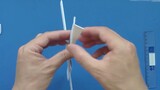 Tutorial on how to fold a boomerang, a dart that can be turned back by adjusting the angle