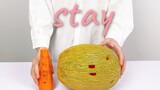 Playing "Stay" with carrots and a cantaloupe