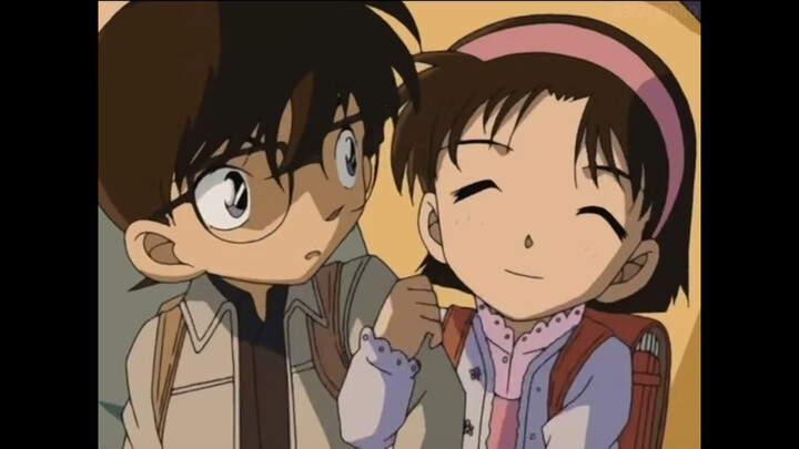 Conan is hugged by