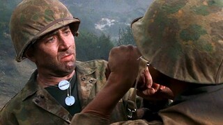 A Marine Protects A Man Who Transmits Messages In His Native Tongue From The Japanese Code Breakers