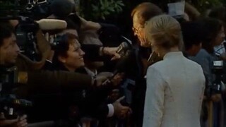 Roger Moore and Elle MacPherson at Cannes, 1990s - Archive Film 1065813