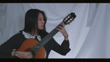 "Croatian Rhapsody" was covered by a woman with classic guitar