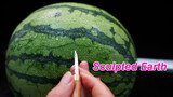 Carve the earth out of a watermelon