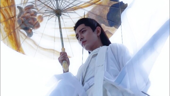 A collection of handsome men in ancient costumes holding umbrellas. We should have what others have!