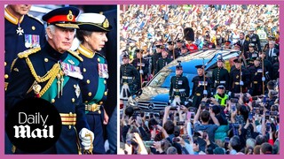 Queen Elizabeth II's children walk behind coffin led by King Charles III