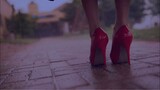 The Lady in Red Shoes