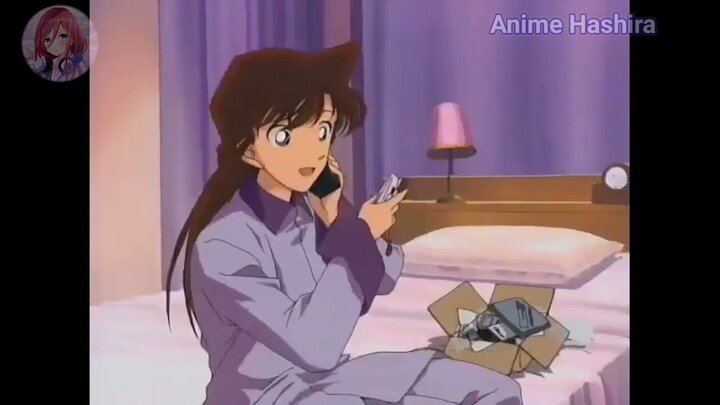 Shinichi teases Ran about the photo he took of her before