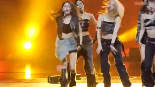 She's trying so hard to perform that her denim skirt has turned