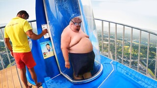 he got stuck in tight water slide..