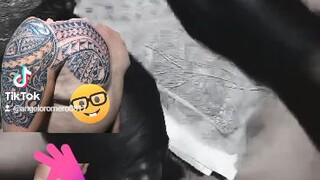 arm and chest peace  polynessian tattoo