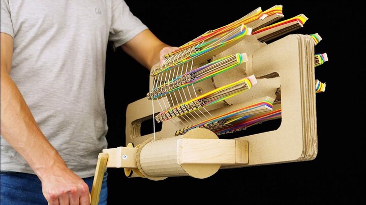 Build a rubber band machine gun out of corrugated paper and hold up to 120 rubber bands!