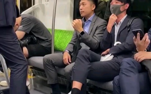 In Japan, black socks, leather shoes and suits are standard for office workers.