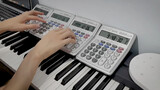 Memainkan Lagu Jay Chou Dengan Menggunakan Tiga Kalkulator.