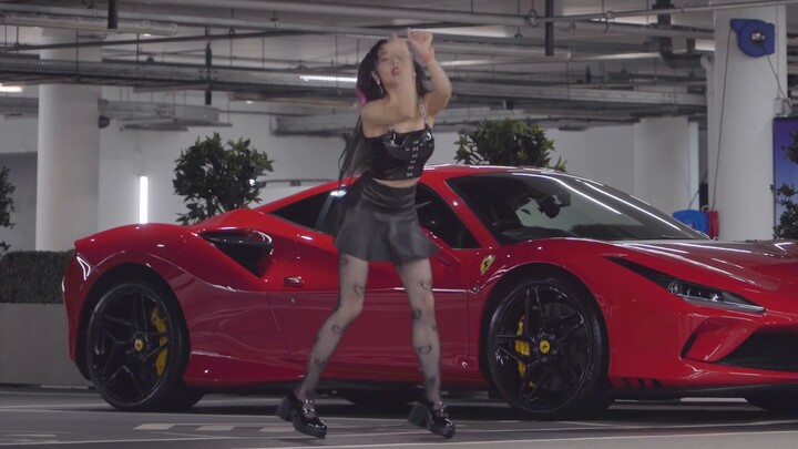 Hot hot girl in London garage with long leather boots three sets of costumes to cover the whole song