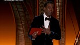 Watch the uncensored moment Will Smith smacks Chris Rock on stage at the Oscars,