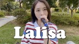 A girl is singing Lisa's "LALISA" in the garden