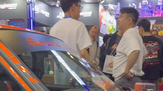 Is the Beijing Model Exhibition a grand gathering for gamers or a carnival for dealers?