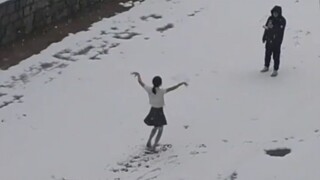 There is a dancer in the snow, dancing barefoot, so brave