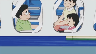 Shizuka dalam bah4ya saat naik kereta api (Anime Doraemon)