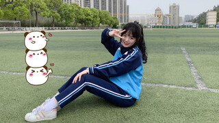 A school girl dances to the song "Xiao Lu Luan Zhuang"