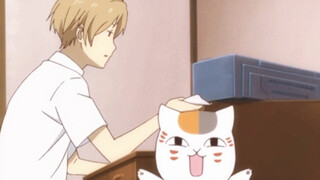 Natsume really dotes on the cat teacher and buys him whatever he wants to eat