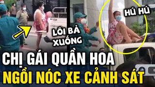 Tự xưng 'PHU NHÂN' người phụ nữ 'QUẦN HOA' trèo lên nóc xe cảnh sát ngồi 'LÀM LOẠN' | Tin 3 Phút