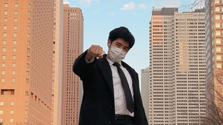 Men in suits dancing in Nishi-Shinjuku