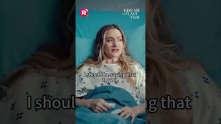 This interloping third party is making a spectacle of herself in front of my hospital bed.