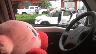 Kirby is driving