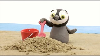 Penguin playing sand castle beach Stop motion cartoon for children - BabyClay