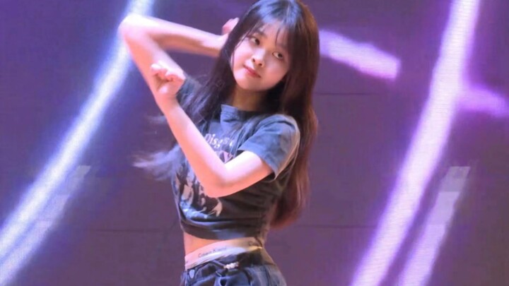 High school student antifragile dances on stage pretending to be a singer
