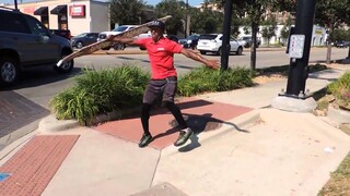 Sign spinner shows off unbelievable skills