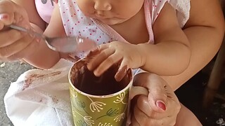 baby eating ice cream for the first time