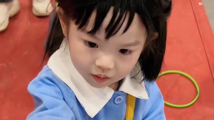 Three-year-old Xiaolan meets her grown-up self