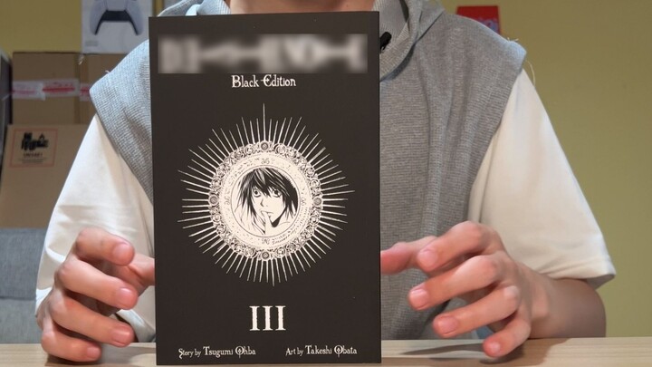 The American version of Death Note comics is displayed, and there is also a comparison between the H