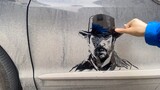 Hand Drawing On A Dusty Car