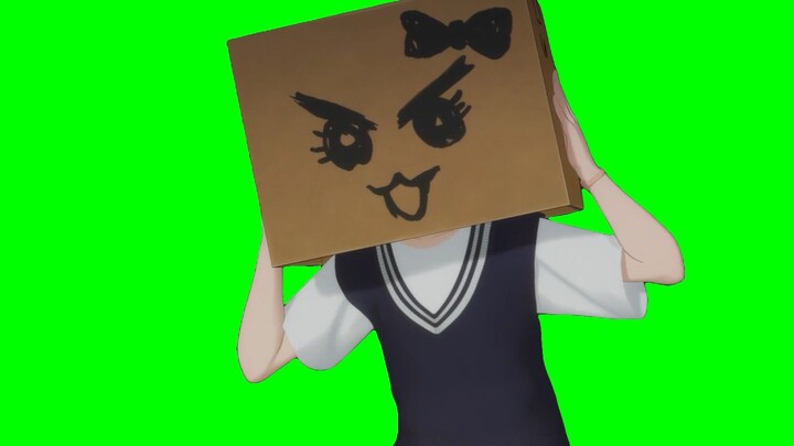 Nina with a cardboard box on her head.GB (with examples)