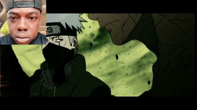 black guy reacts to Obito's death inside his car.