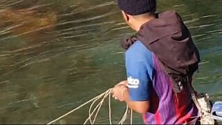 cast net fishing in Nepal | cast netting | himalayan trout fishing in Nepal |