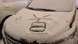 A car covered with snow